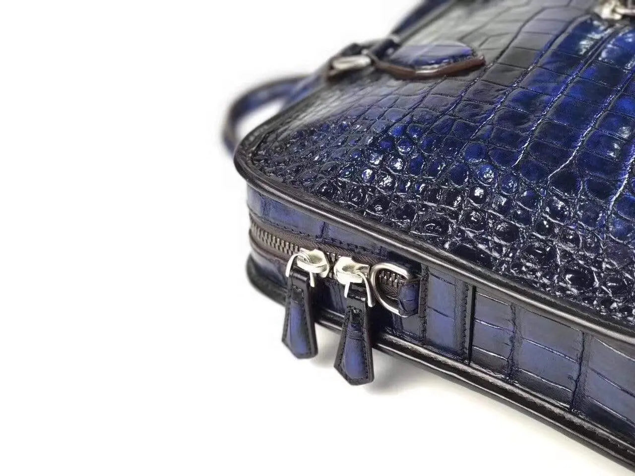 Vintage crocodile leather briefcase by Rossie Viren with top handles, ideal for business and professional use.