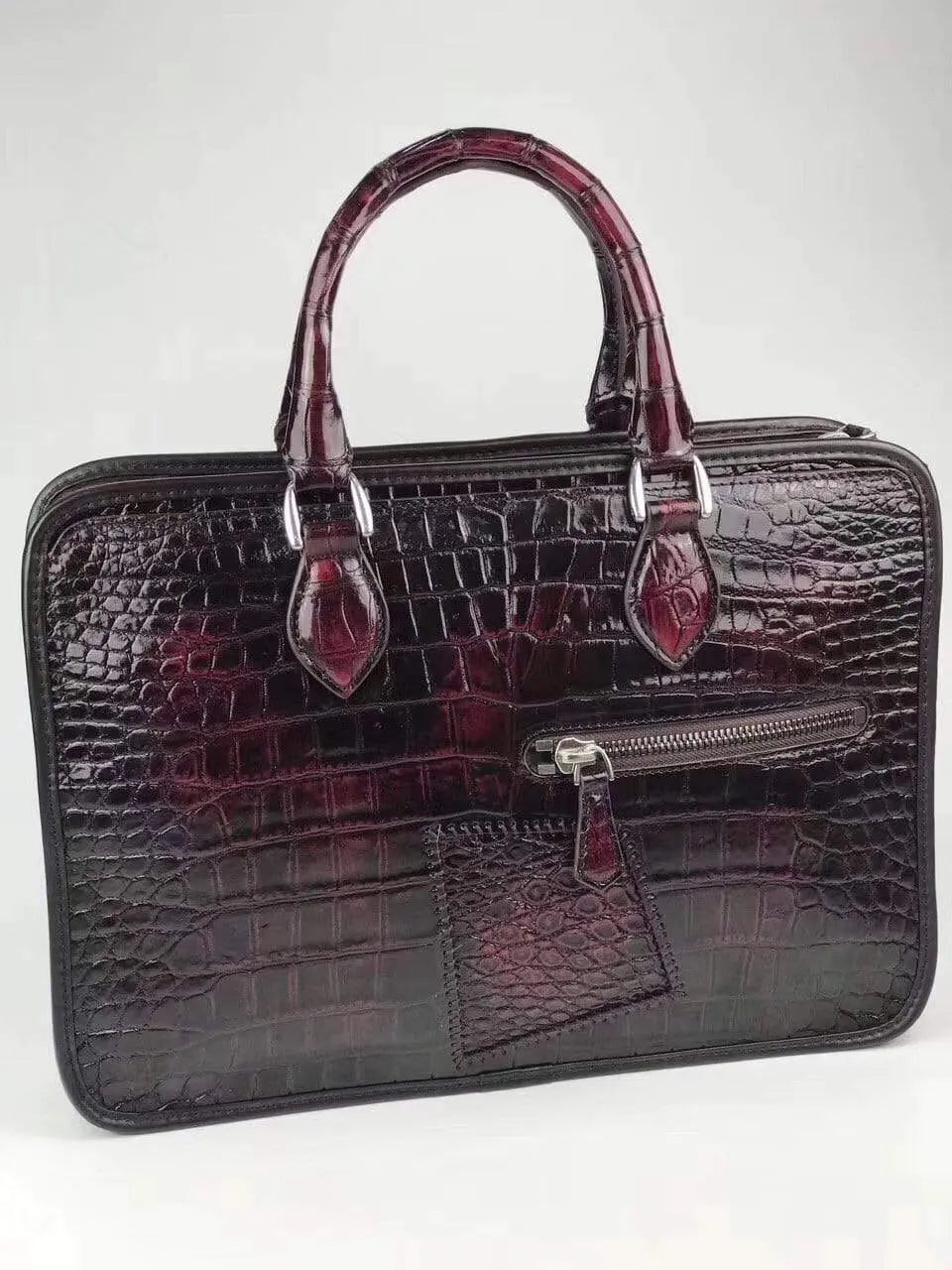 Vintage crocodile leather briefcase by Rossie Viren featuring top handles and a classic business bag design.