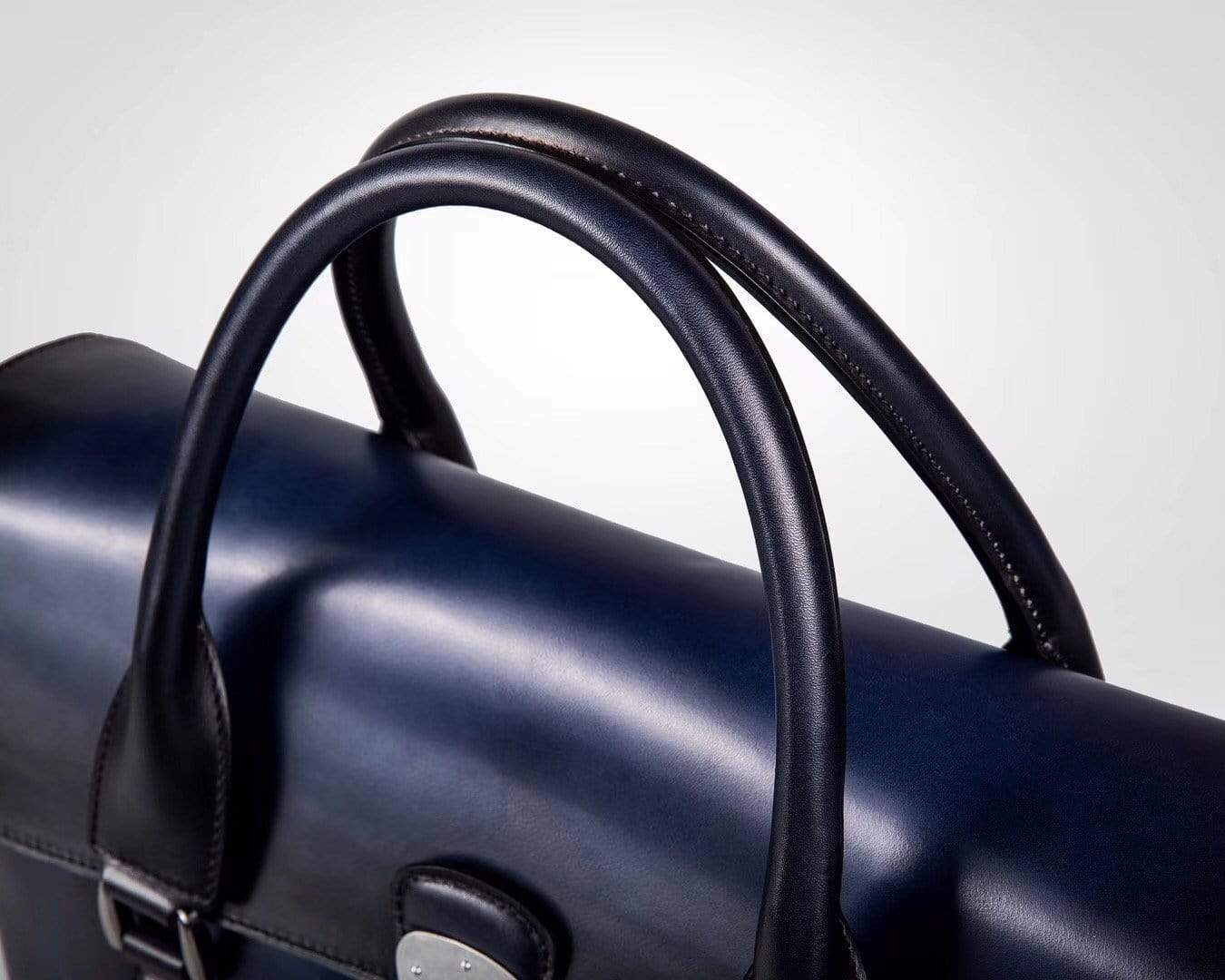 Blue vintage Rossie Viren leather foldover briefcase with smooth cowhide, large size, and classic handbag design.