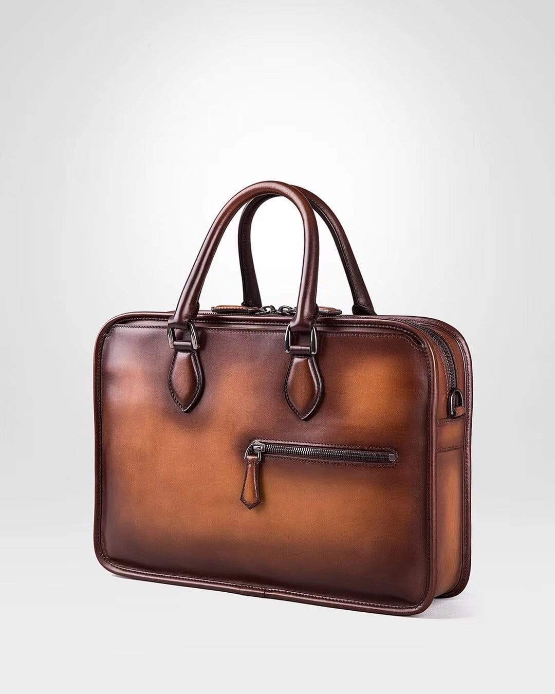 Vintage smooth cowhide leather handbag by Rossie Viren, featuring a classic design with sturdy handles and elegant craftsmanship.