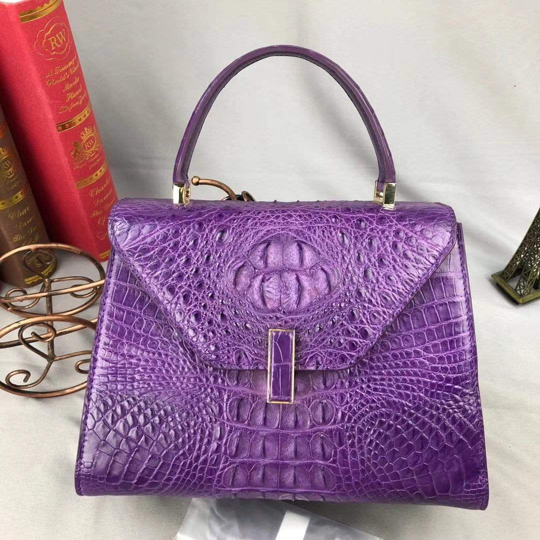 Purple crocodile leather top handle handbag for women by Rossie Viren, showcasing a stylish and elegant accessory.