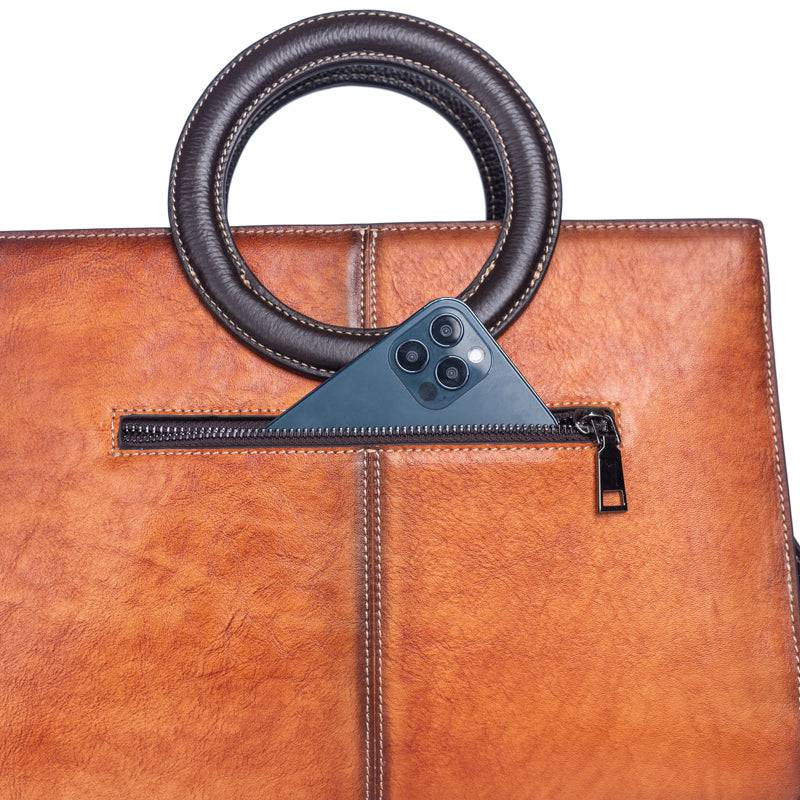 Rossie Viren women's crossbody tote bag with leather circular handle, small handbag with stylish design and compact shape.