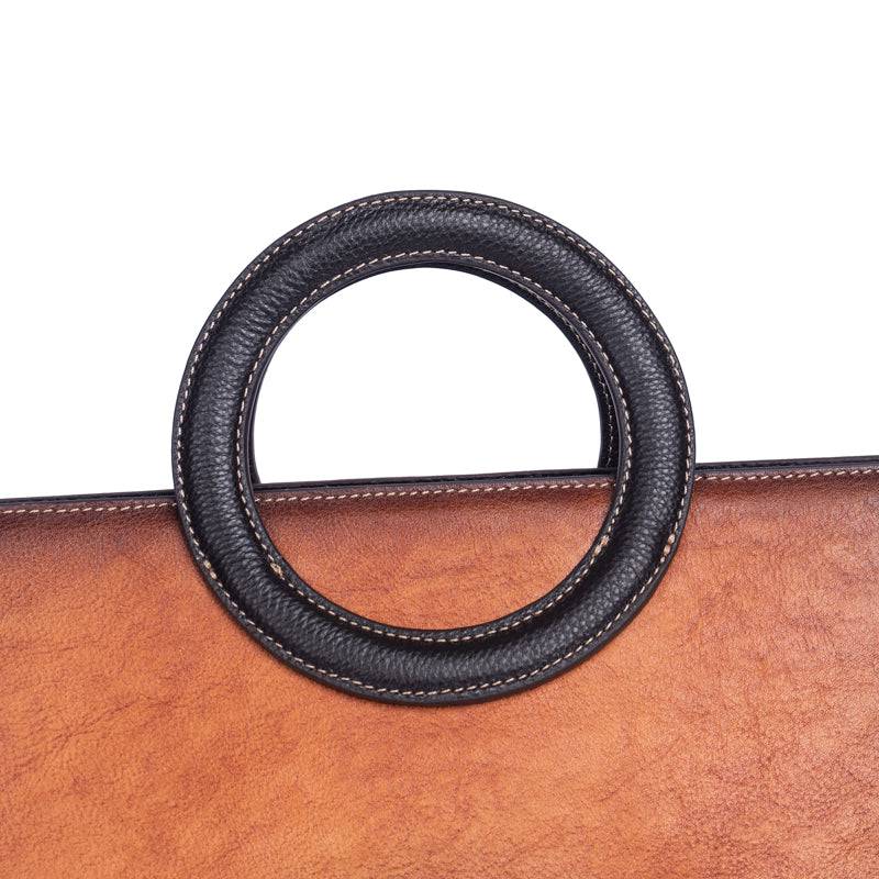 Rossie Viren women's crossbody tote bag with leather circular handle, small handbag with stylish design and compact size.