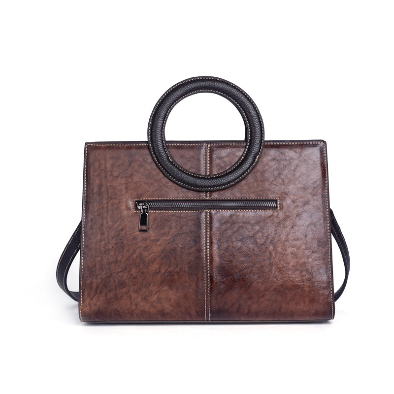 Rossie Viren women's small crossbody tote bag with leather circular handle, compact handbag with stylish design and shoulder strap.
