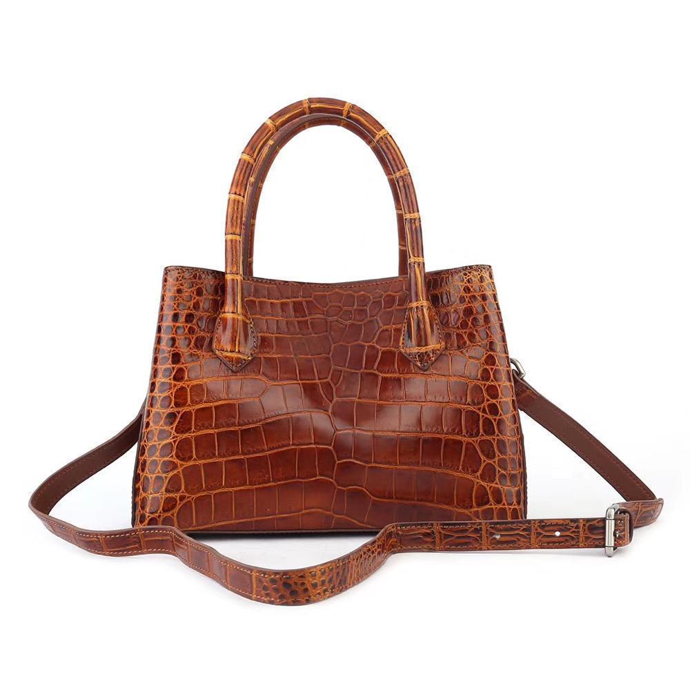 Brown women's mini tote handbag with top handle by Rossie Viren, featuring a sleek compact design and elegant style.