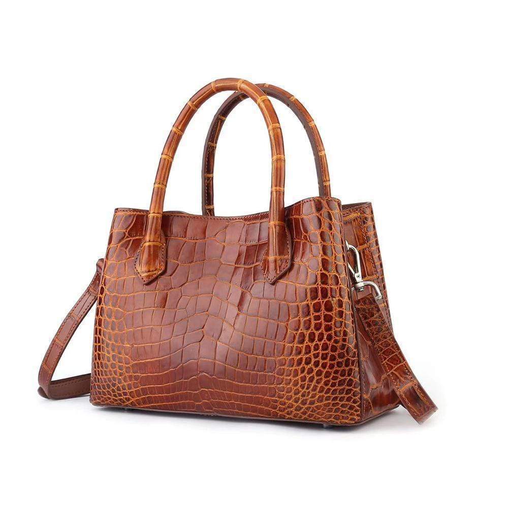 Brown women's mini top handle tote bag by Rossie Viren, featuring a stylish handbag design with a compact, elegant silhouette.