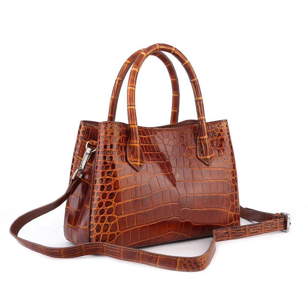 Brown women's mini top handle tote bag by Rossie Viren, featuring a compact handbag design with top handle and stylish finish.