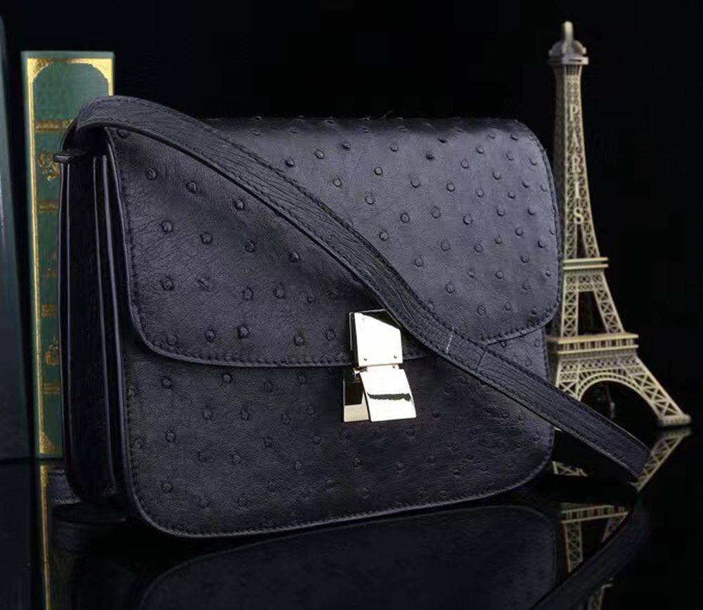Women’s ostrich leather cross body messenger bag by Rossie Viren, stylish handbag with textured ostrich leather and adjustable strap.