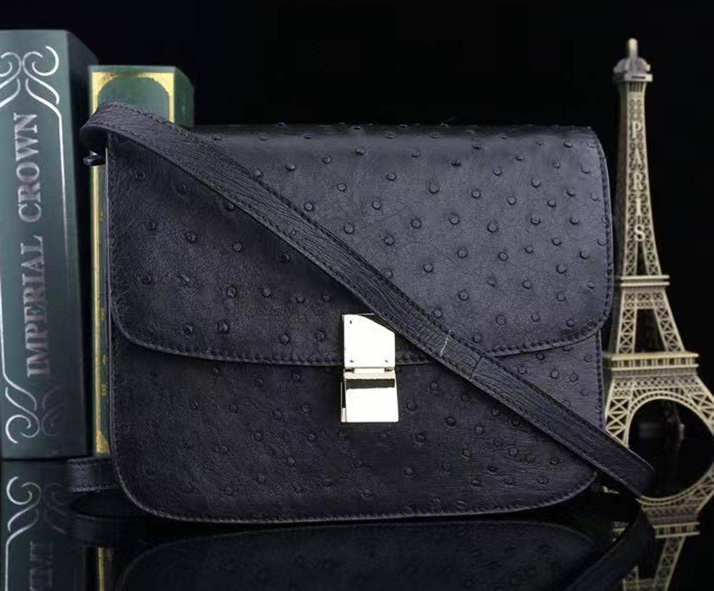 Women’s ostrich leather cross body handbag by Rossie Viren, stylish messenger shoulder bag with textured leather finish.