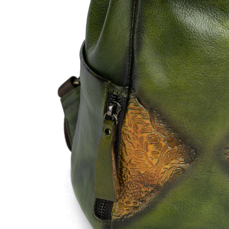 Rossie Viren women's vintage leather backpack handbag with handle and shoulder strap, stylish and durable for everyday use.