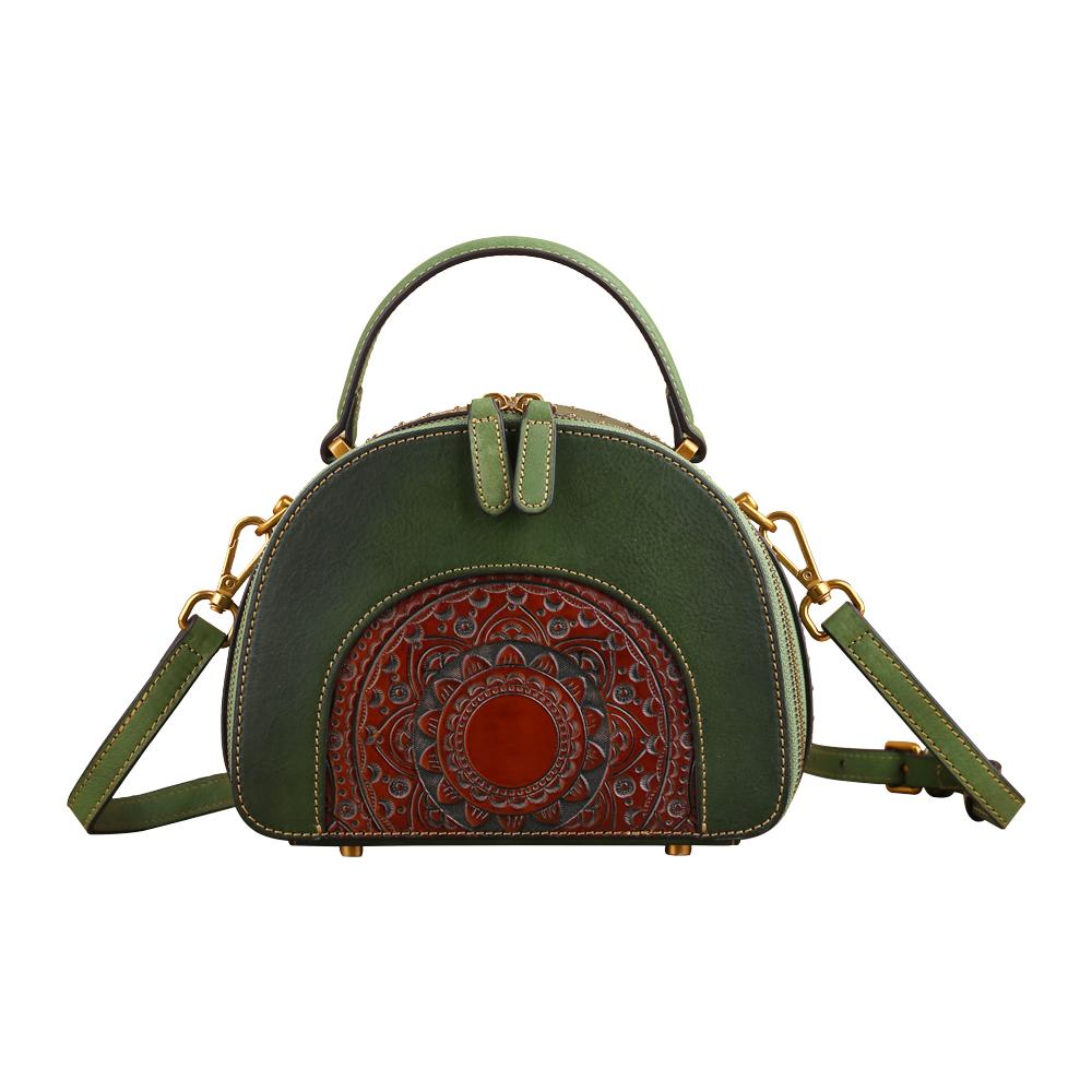 Rossie Viren women's vintage mini half-moon crossbody bag with studded design and top handle, perfect for everyday use.