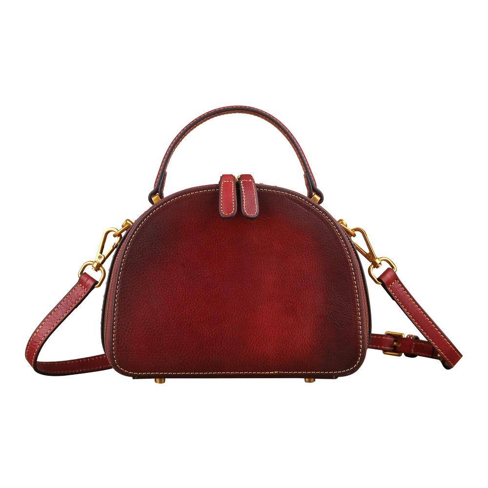 Rossie Viren women's vintage mini half-moon crossbody bag with studded details and top handle, stylish for everyday wear.