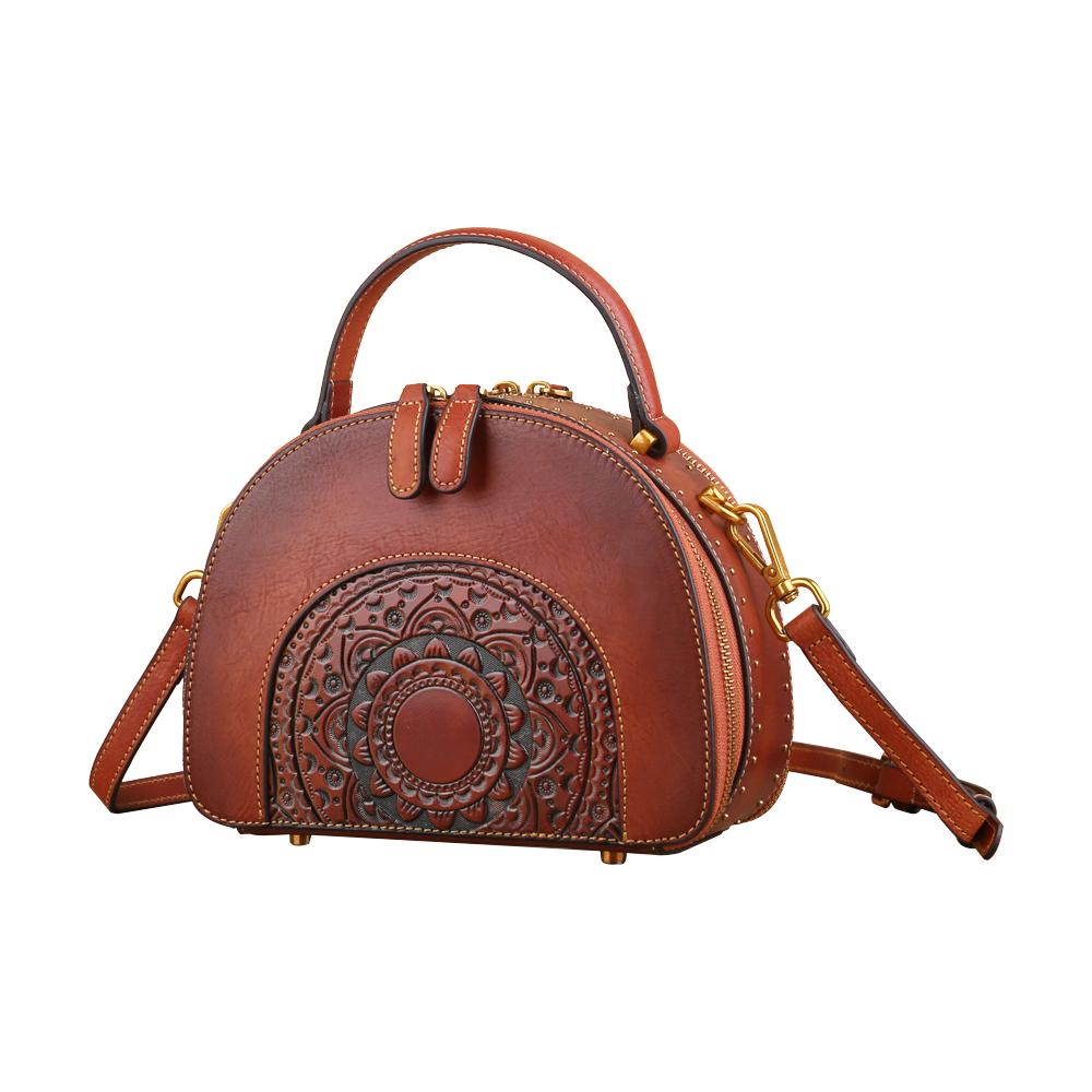 Rossie Viren women's vintage studded mini half-moon top handle crossbody shoulder bag with structured design and adjustable strap.
