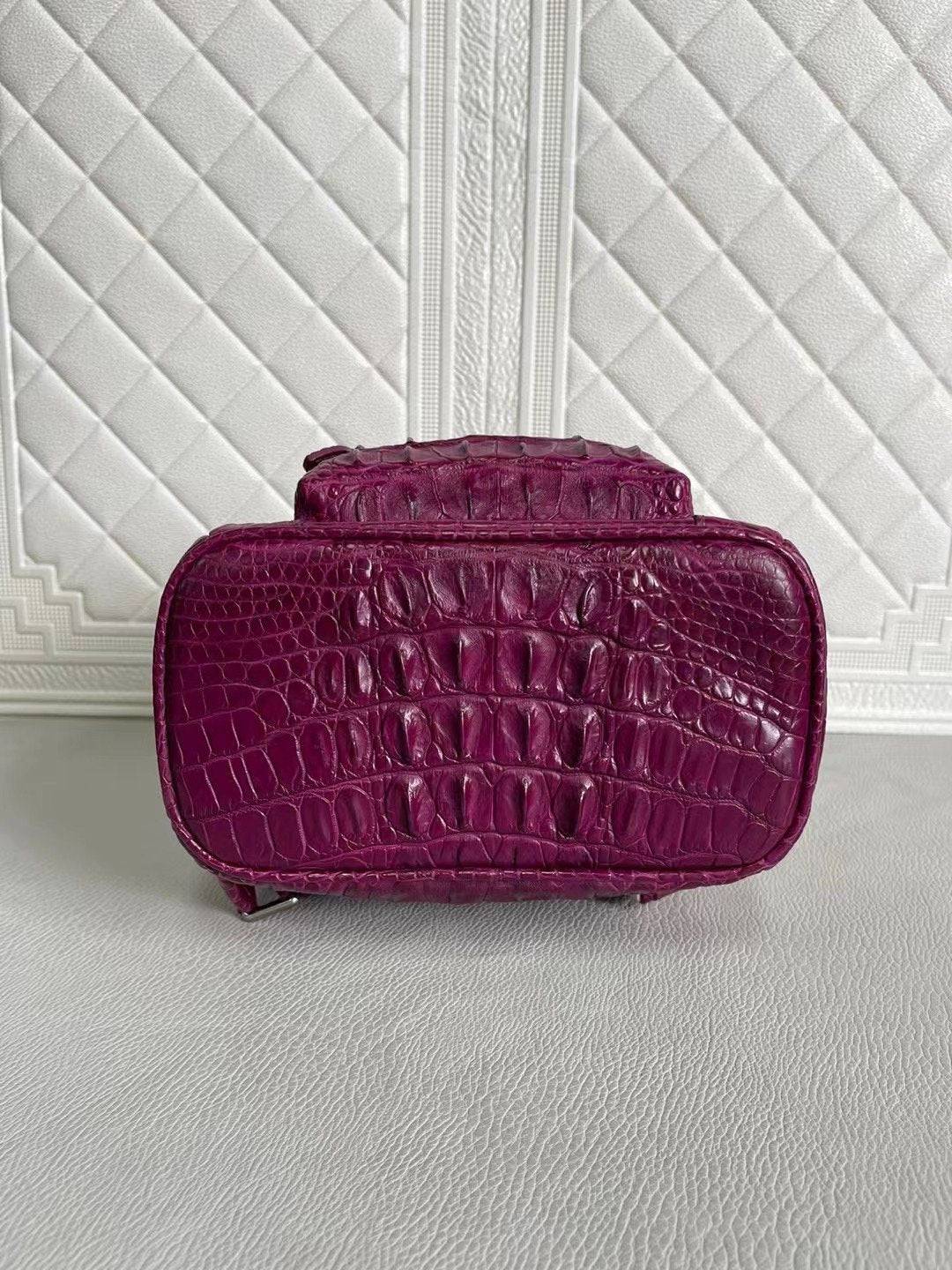 Orange and wine red crocodile leather handbag by Rossie Viren, stylish women's backpack with textured crocodile pattern.