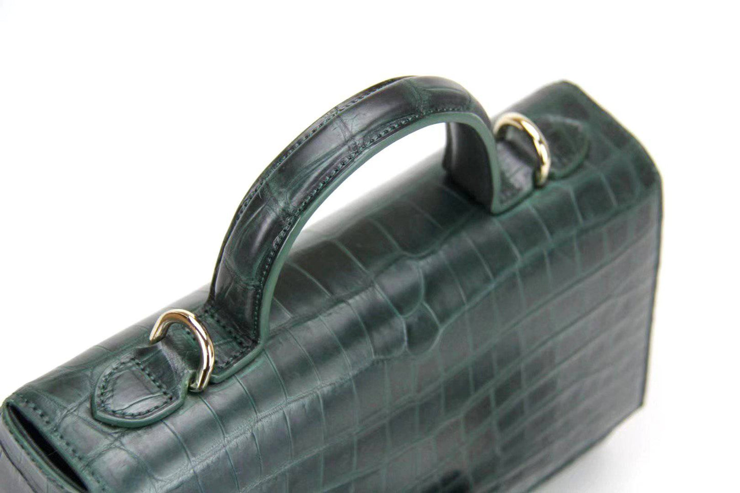 Rossie Viren women's crocodile leather messenger handbag with cross-body strap and top handle, stylish and luxurious for everyday use.