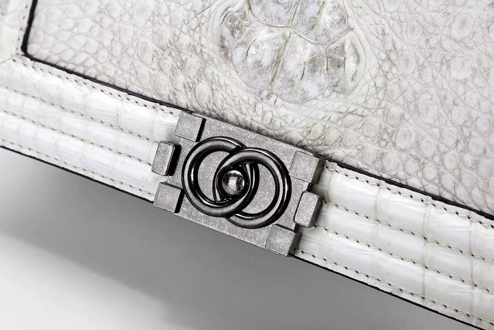 Women's crocodile leather shoulder flap chain bag by Rossie Viren, featuring a stylish design with a chain strap and flap closure.