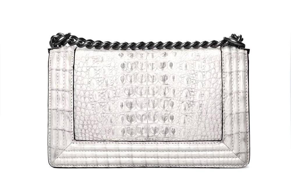 Women's crocodile leather shoulder flap chain bag by Rossie Viren, featuring a stylish design with chain strap and elegant flap closure.