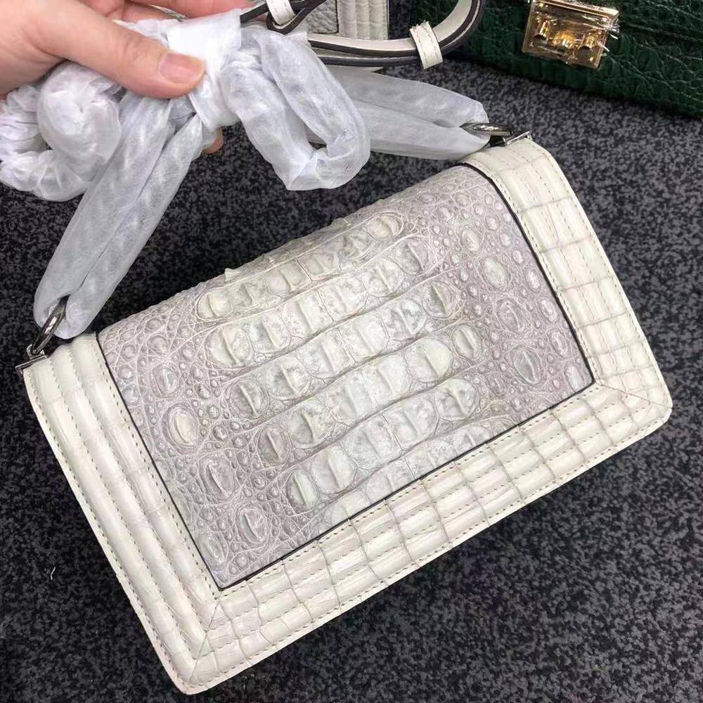 Women's crocodile leather shoulder flap chain bag by Rossie Viren, featuring a stylish design with a chain strap and flap closure.