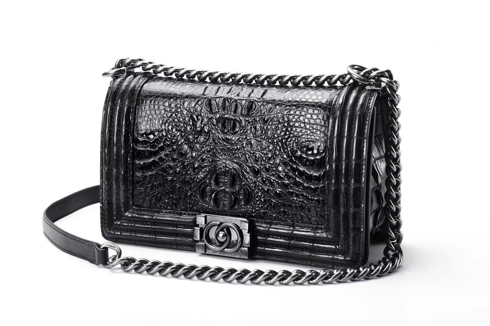 Women's crocodile leather shoulder flap chain bag by Rossie Viren, featuring a stylish design and elegant chain strap.