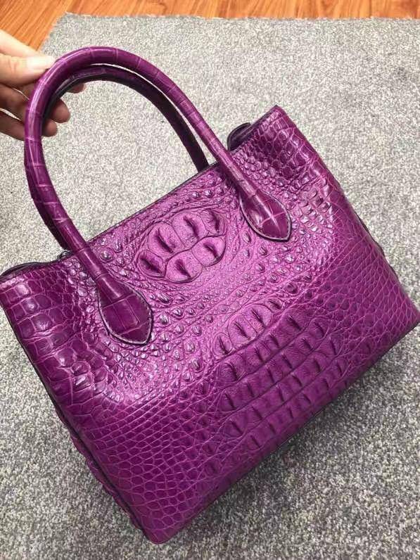 Large women's crocodile skin leather satchel handbag by Rossie Viren, 35cm, with textured crocodile pattern and sturdy handle.