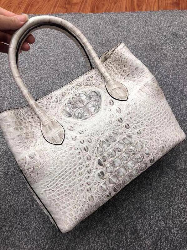Large women's crocodile skin leather satchel bag by Rossie Viren, featuring a textured crocodile pattern and spacious design.