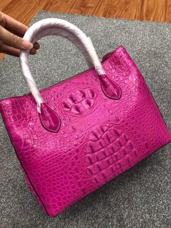 Large women's crocodile skin leather satchel bag by Rossie Viren, featuring a stylish 35cm design and textured crocodile pattern.