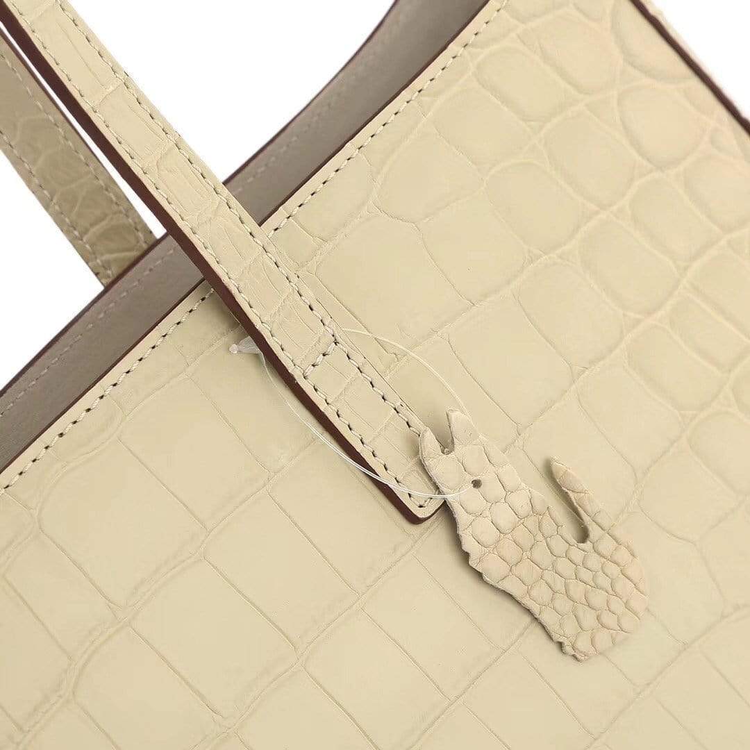 Cream women's genuine leather tote bag by Rossie Viren, slouchy shoulder shopper with spacious interior and stylish design.