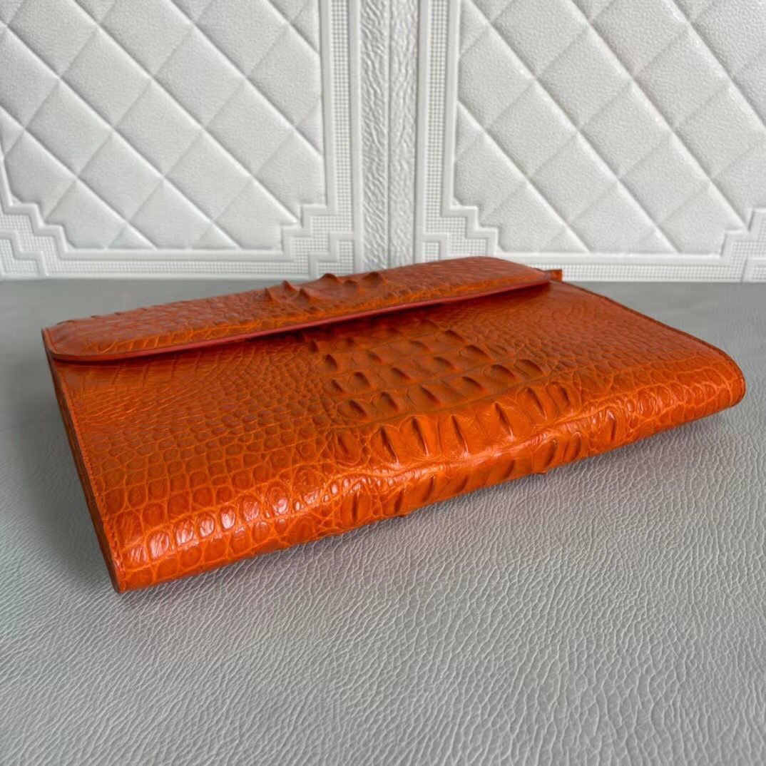 Rossie Viren women's genuine crocodile leather clutch with card holder compartment, showcasing textured crocodile leather and elegant design.
