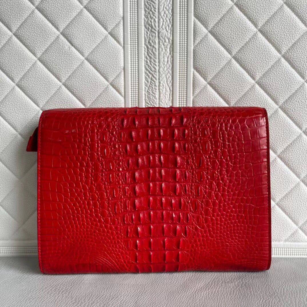 Women's genuine crocodile leather clutch card holder by Rossie Viren, featuring a sleek and textured crocodile pattern.