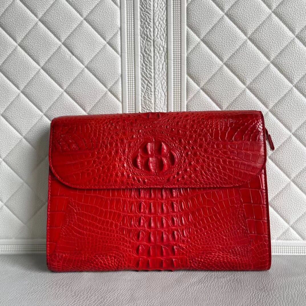 Women's genuine crocodile leather clutch by Rossie Viren, featuring a sleek card holder design with elegant texture.