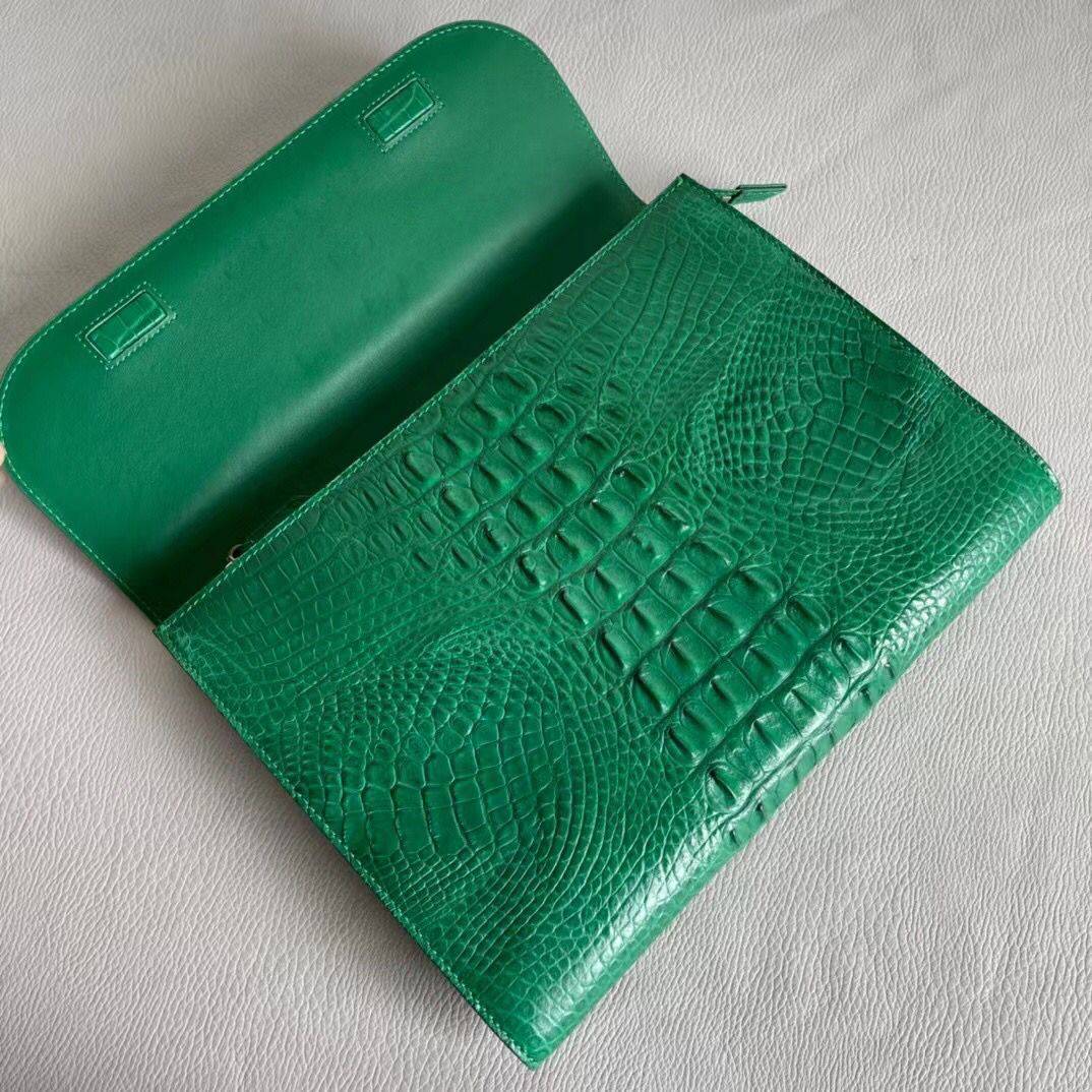 Women's genuine crocodile leather clutch card holder by Rossie Viren, featuring a sleek and textured crocodile pattern.