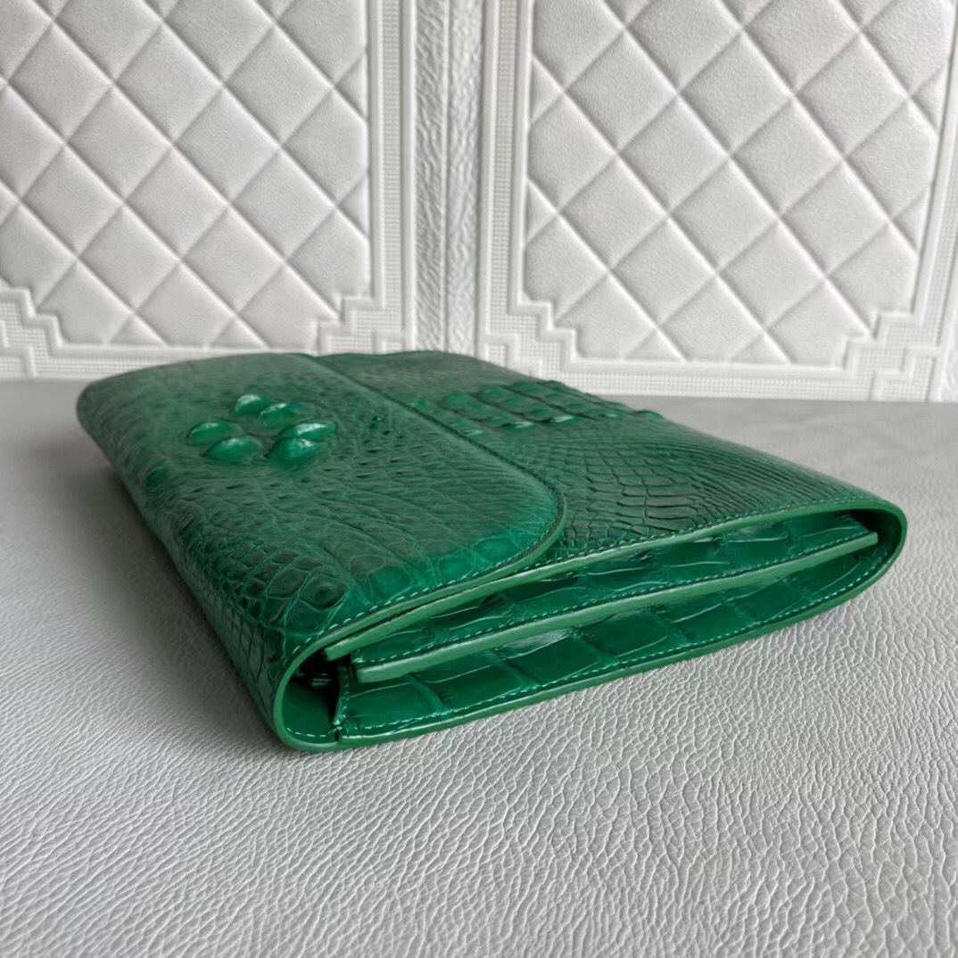 Rossie Viren women's genuine crocodile leather clutch with a card holder design, showcasing textured crocodile leather exterior.