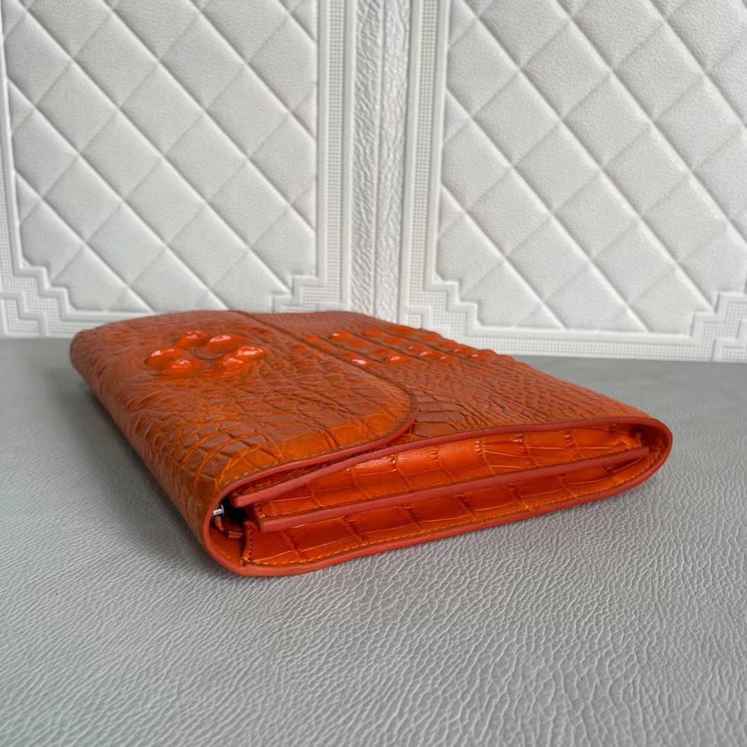 Women's genuine crocodile leather clutch card holder by Rossie Viren with a sleek, textured crocodile pattern and compact design.
