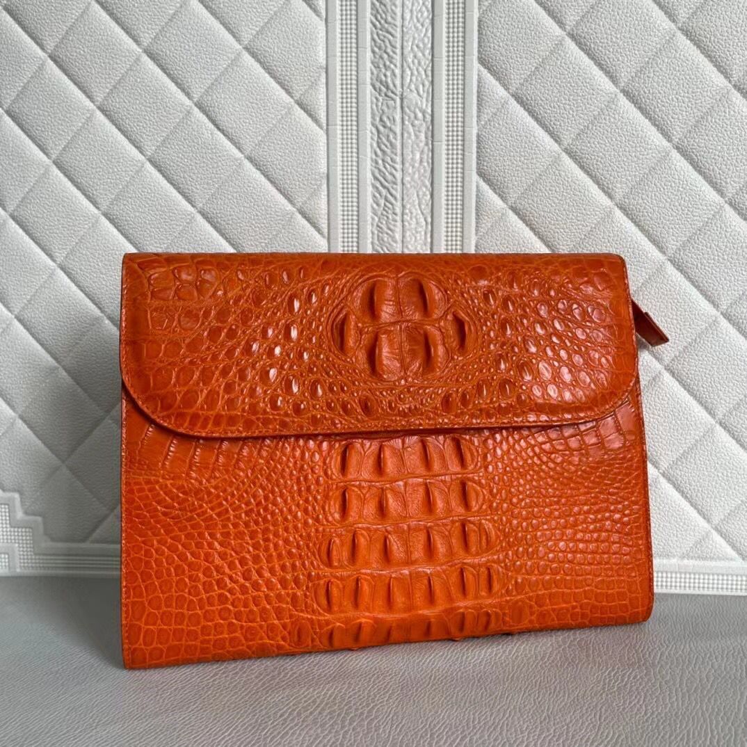 Women's genuine crocodile leather clutch by Rossie Viren, featuring a sleek card holder design with elegant texture.
