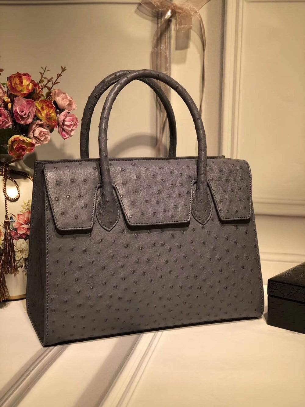Women's genuine ostrich leather flap-over zipper tote bag by Rossie Viren, stylish handbag with textured leather finish.