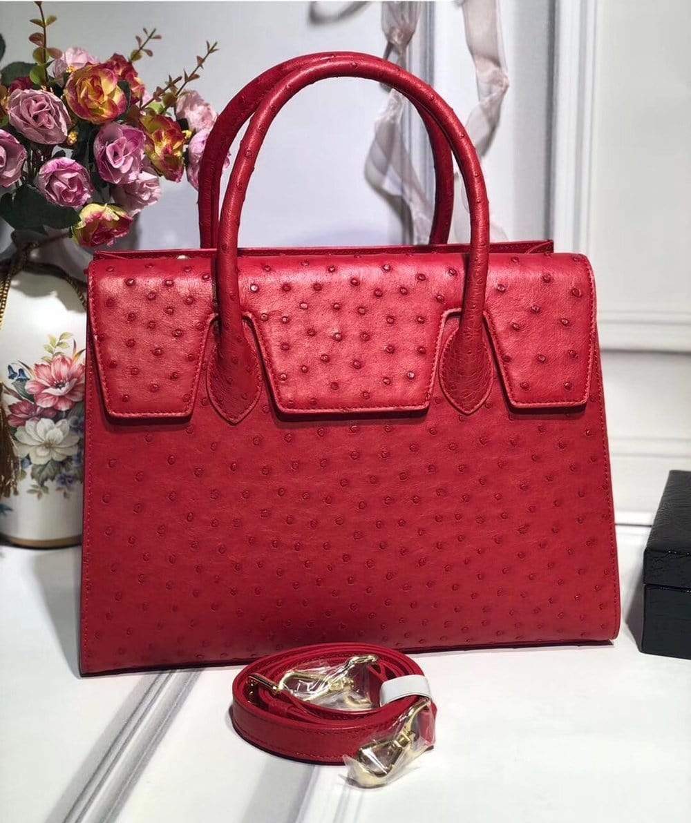 Women's genuine ostrich leather handbag with flap over design and zipper closure, Rossie Viren tote bag on a white background.