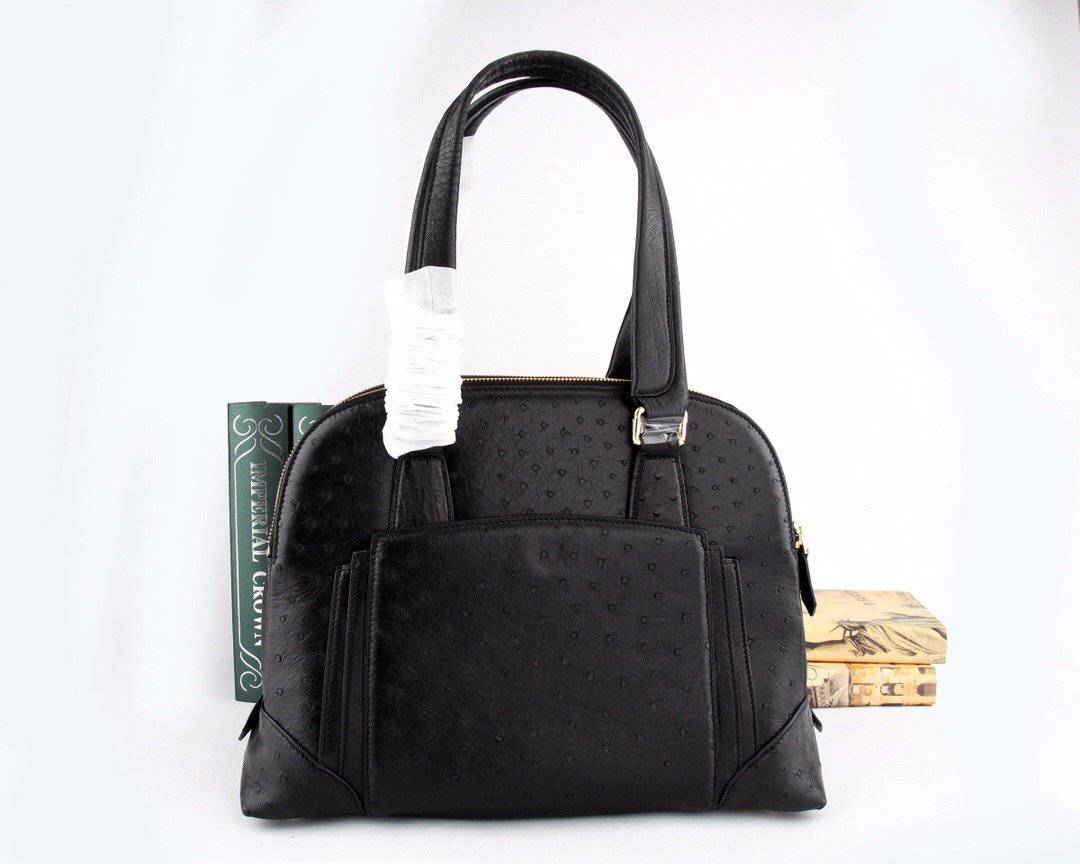 Women's ostrich leather top handle shoulder handbag by Rossie Viren with a sleek design and elegant black finish.