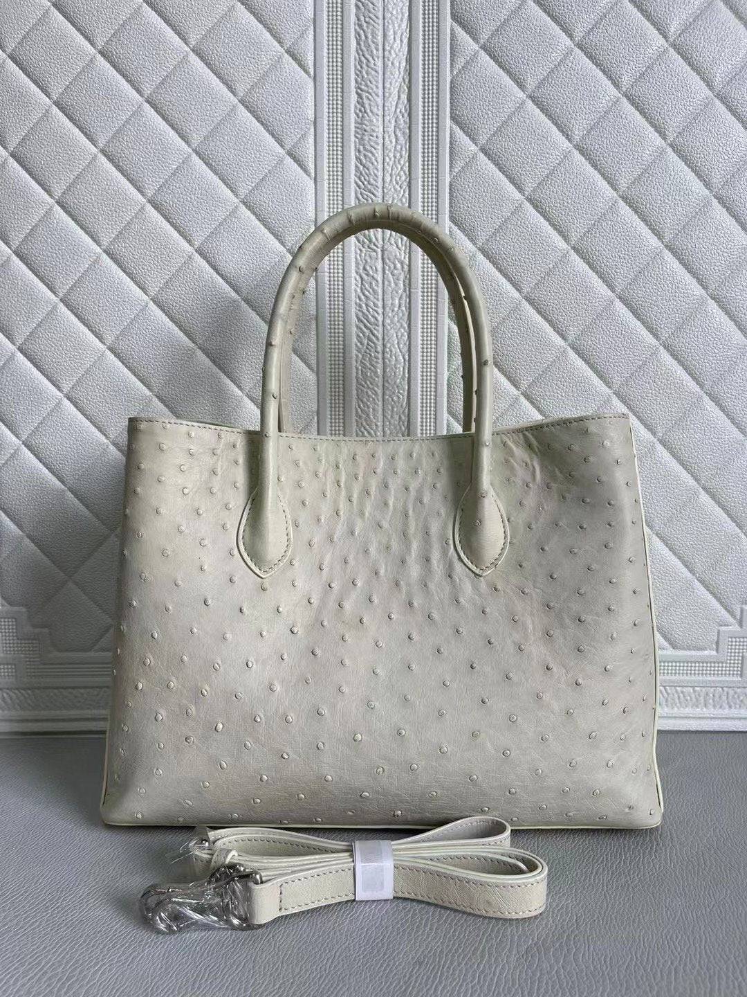 Blue and cream women's ostrich leather handbag with top handle and shoulder strap, Rossie Viren cross-body bag, 33cm.