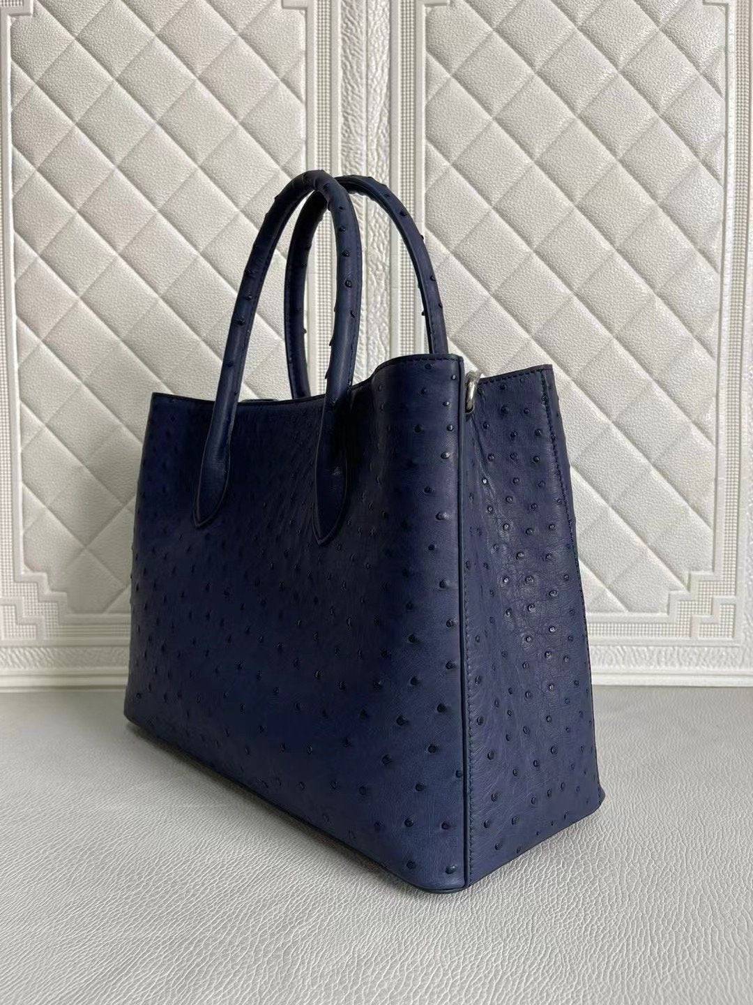 Blue and purple women's ostrich leather handbag with top handle and crossbody strap, 33cm, by Rossie Viren.