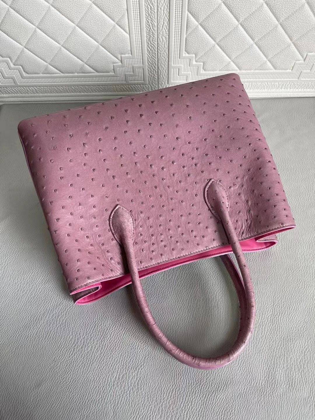 Women's ostrich leather handbag with top handle and crossbody strap in blue and purple, 33cm, by Rossie Viren.