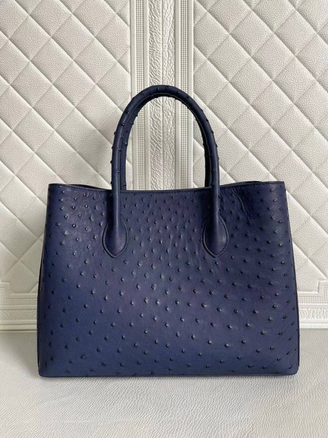 Rossie Viren women's ostrich leather handbag with top handle and crossbody strap in blue and purple, 33cm size.