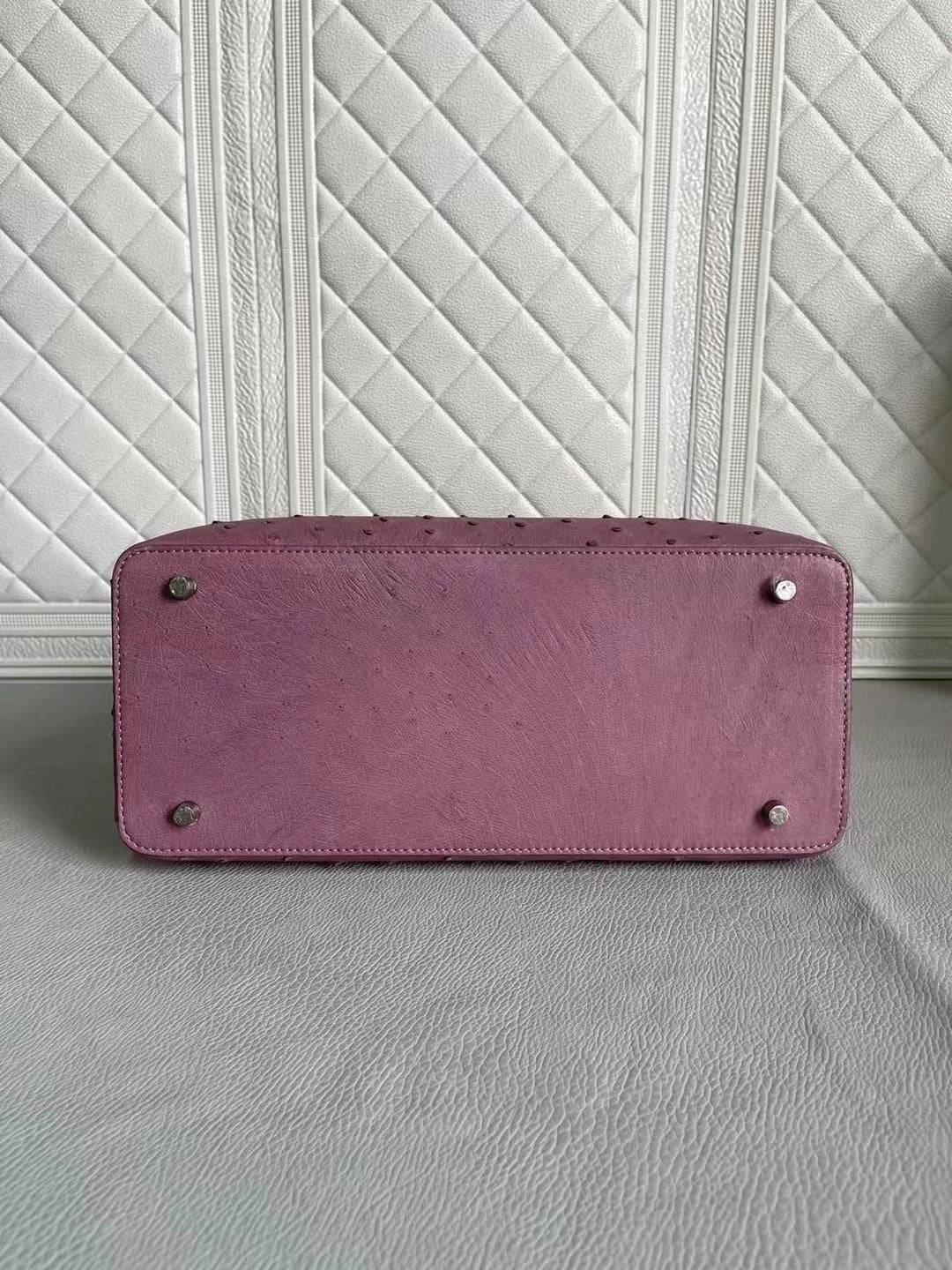 Rossie Viren women's ostrich leather handbag with top handle and cross-body strap in blue and purple, 33cm.