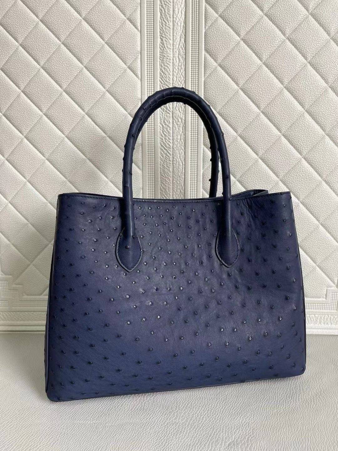 Rossie Viren women's ostrich leather handbag with top handle and crossbody strap in blue and purple, 33cm size.