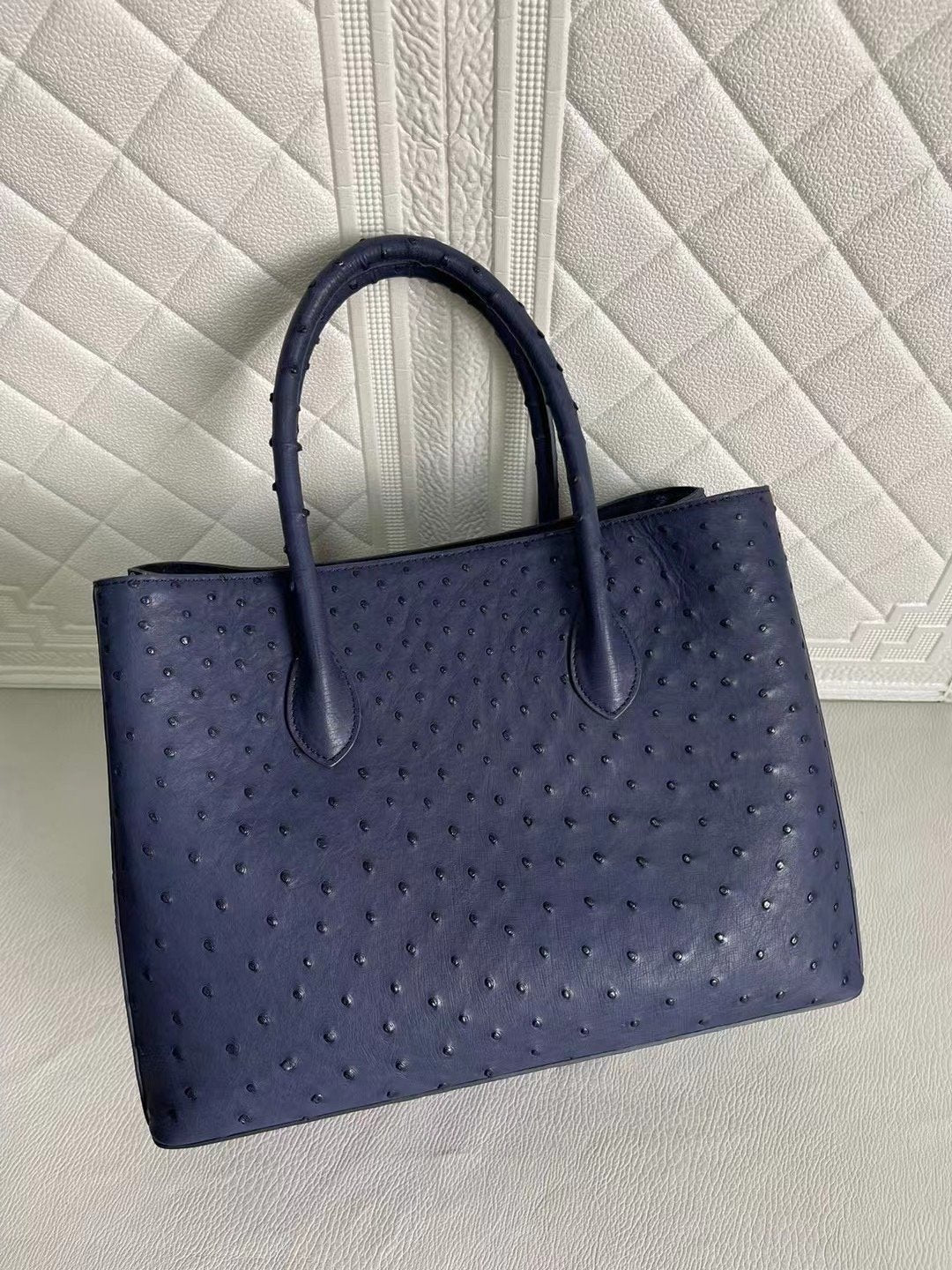 Rossie Viren women's ostrich leather handbag with top handle and crossbody strap in blue and purple, 33cm size.
