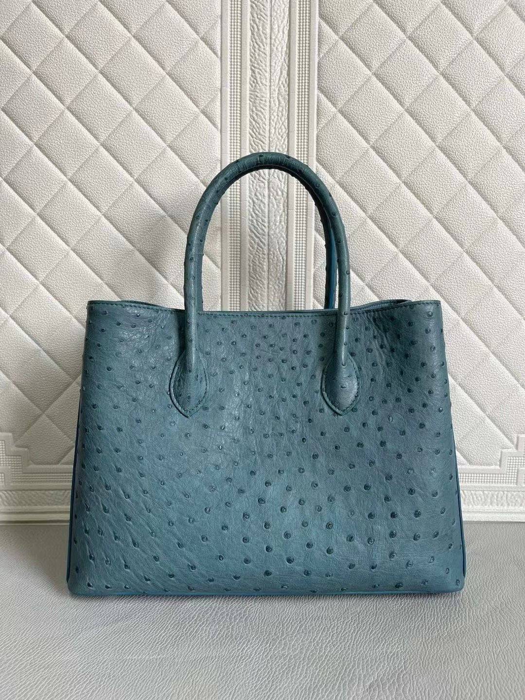 Rossie Viren women's ostrich leather handbag with top handle, shoulder and crossbody strap in coral blue and yellow, 33cm.