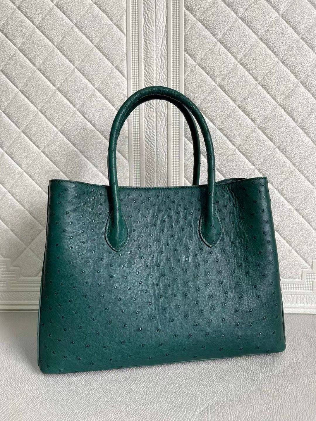 Rossie Viren women's ostrich leather handbag with top handle and crossbody strap in peach and green, 33cm size.