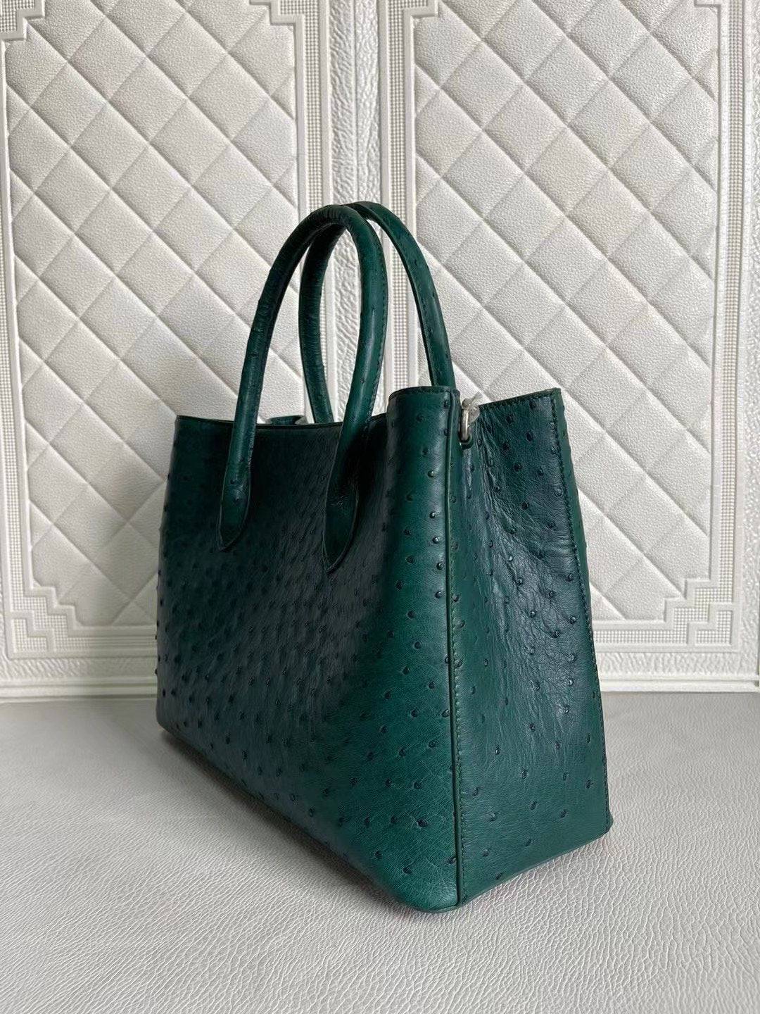 Rossie Viren women's ostrich leather handbag with top handle and shoulder strap in peach and green, 33cm cross-body bag.