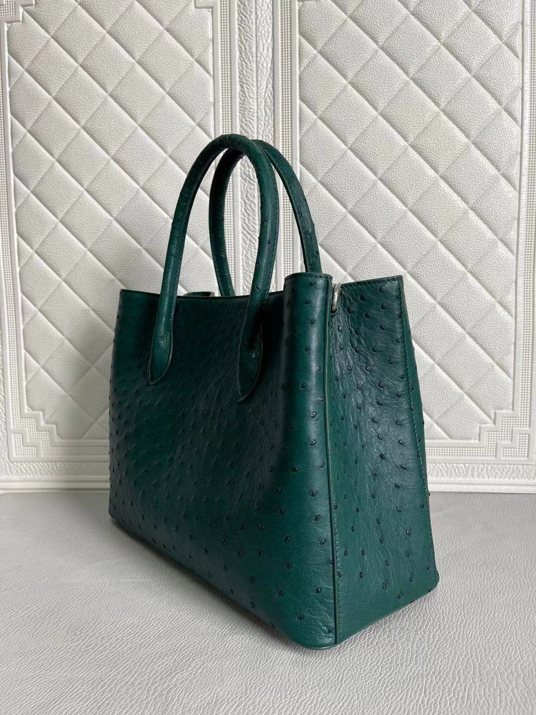 Rossie Viren women's ostrich leather handbag with top handle and crossbody strap in peach and green, 33cm size.