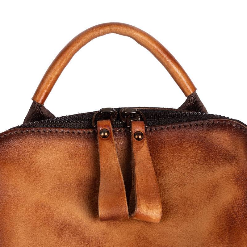 Rossie Viren women's vintage leather large backpack with sturdy straps and spacious interior, perfect for everyday use.