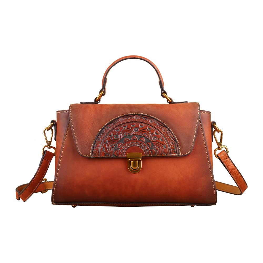 Women's vintage leather tote handbag with small top-handle design by Rossie Viren, featuring classic style and durable craftsmanship.